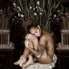 portrait of a woman hugging her knees