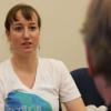Rachael L. Ticho Zacks, outstanding graduate of the College of Arts and Sciences, speaks with Dean Todd Gleeson.