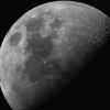 Black and white photo of moon craters