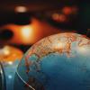 Globe with magnifying glass