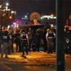 Police in front of a large crowd