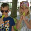 Children enjoying popsicles