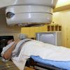 A patient prepares to undergo radiation therapy.