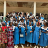 School girls holding PridePads in Cameroon