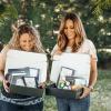 Katie Wall and Courtney Jacobson, co-founders of Culture Biz, holding kits