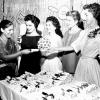 Image of PHT (Putting Husband Through) degrees being awarded to housewives