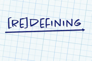 "redefining" written in blue on graph paper