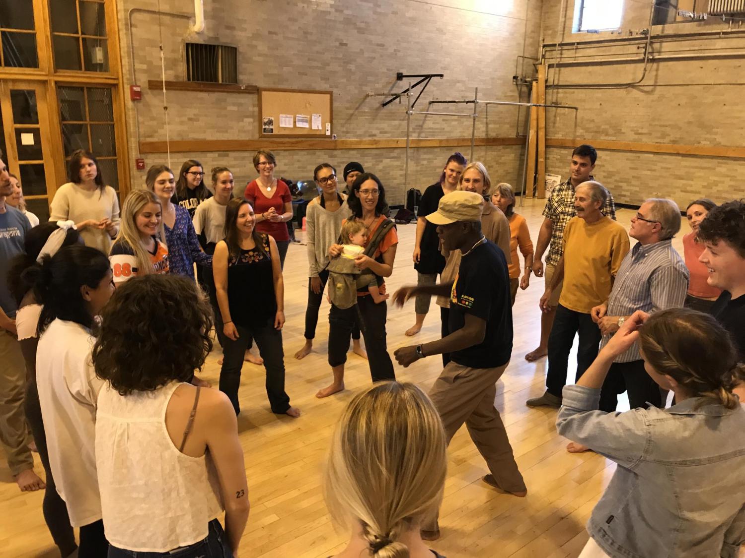 CU Professor Nii Armah Sowah with students in Performance for Community Engagement