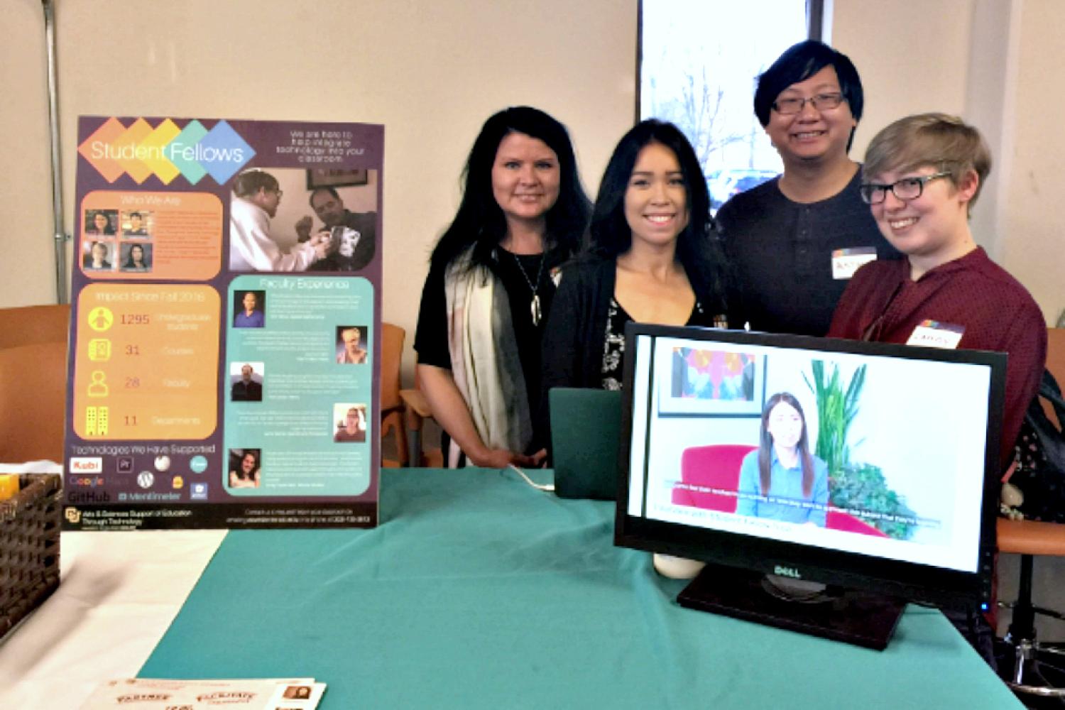 Student Fellows staffing an information booth at the 2018 ATDT Showcase