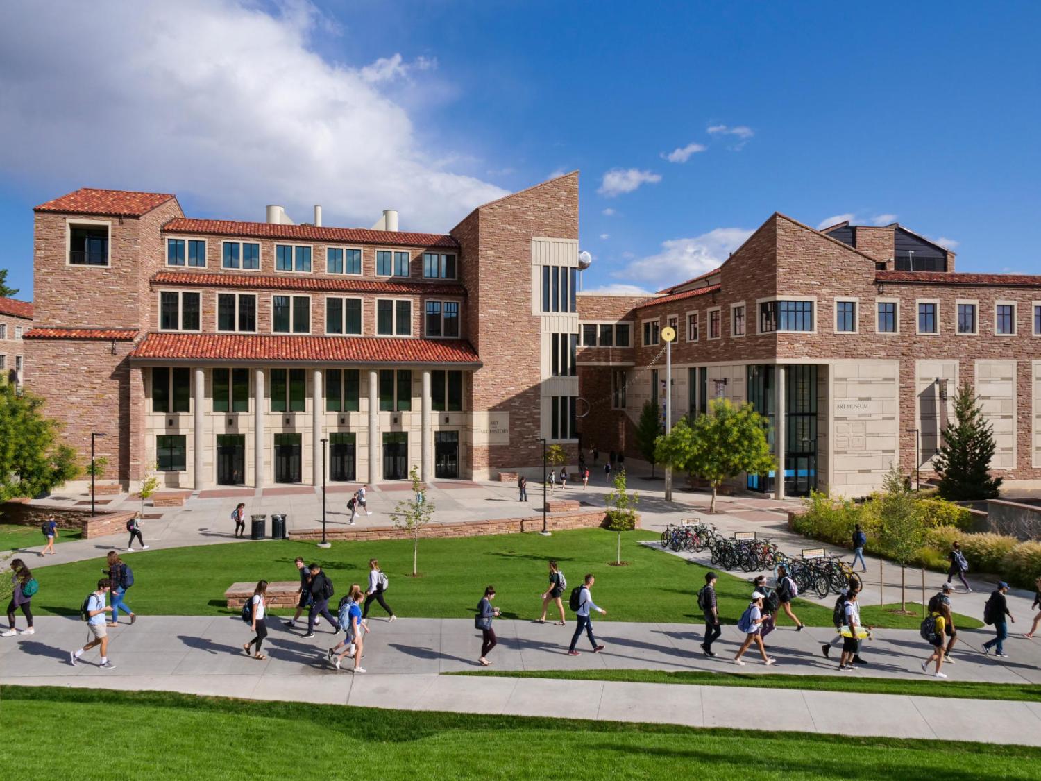Students walking outside of the visual arts complex at CU Boulder