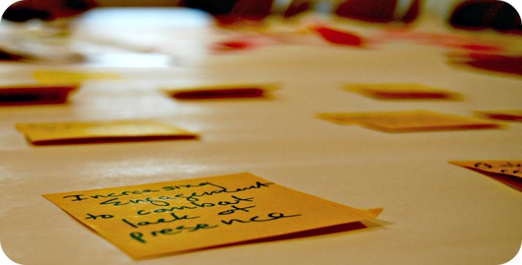Sticky note on brainstorming board