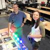 Seth Hornstein and Rachel Bowyer demonstrate the equipment used in the spectroscopy lab.