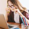 student nervously biting a pencil