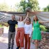 The four-person Side by Side project leadership team grinning while holding a giant youth made bird costume above their heads, with wings extended out beyond either side of them. From left to right: Drs. Shawhin Roudbari, Chelsea Hackett, Rebecca Safran, and Beth Osnes.