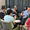 Tech Camp participants discuss Universal Design for Learning in small groups