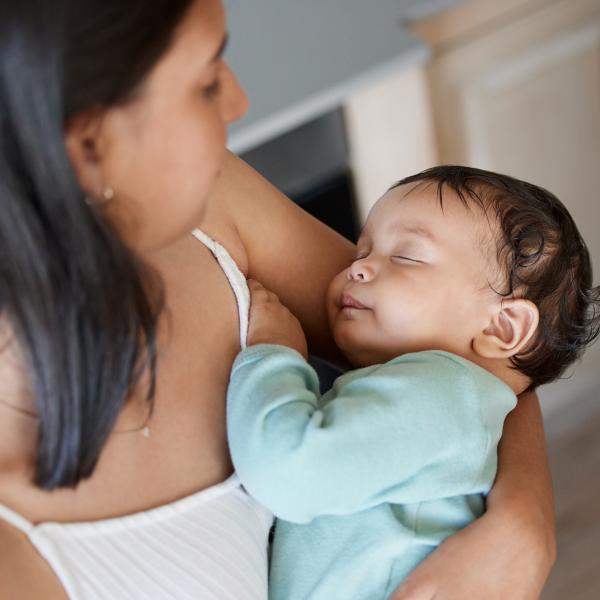 Woman holding a baby in her arms