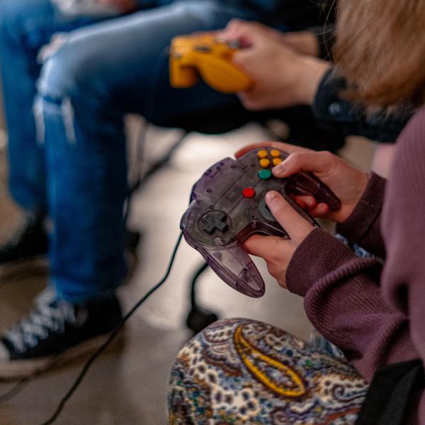person holding game controler