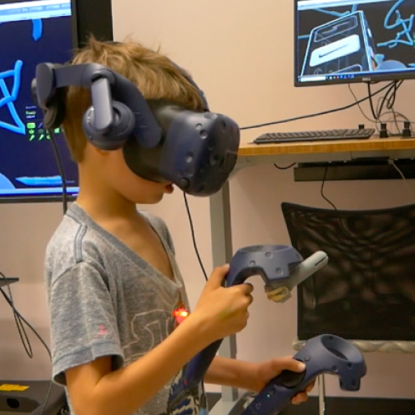 Child wearing VR headset