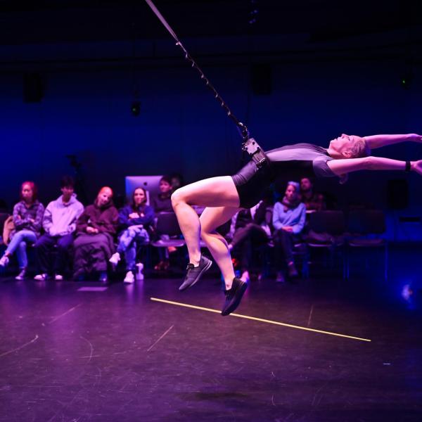 anna pilot swinging on trapeze