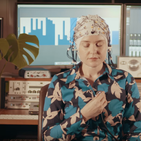 grace leslie with nodes on her head for measuring heart rate and other bodily rhythms related to music