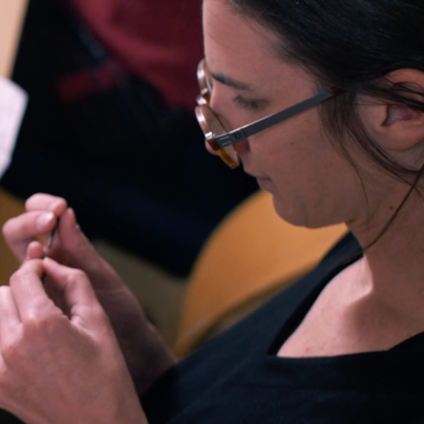 Professor Devendorf soldering and weaving