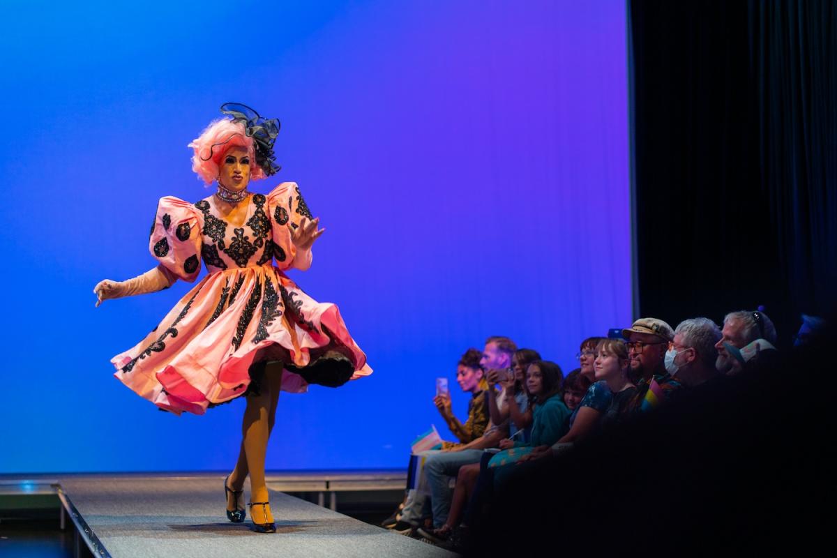 Drag performer struts the runway in the B2 Black Box