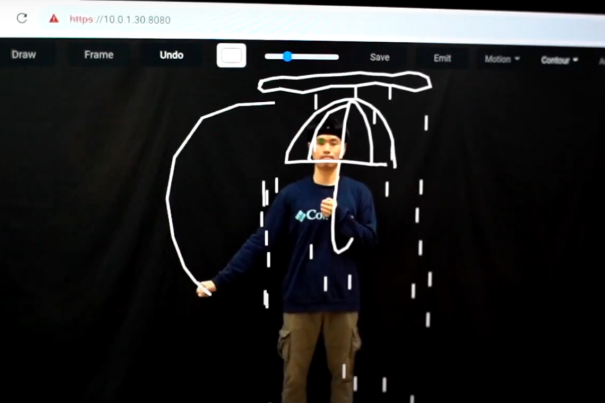 An Asian man standing. A digital overlay of a white drawing of an umbrella and rain is overlaid. A white line extends in an arc from his hand.