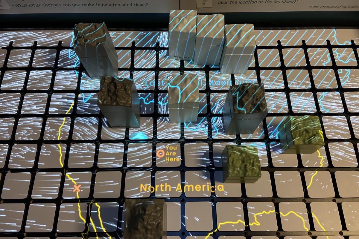 3d blocks of topography laid out on a grid with a projection on top