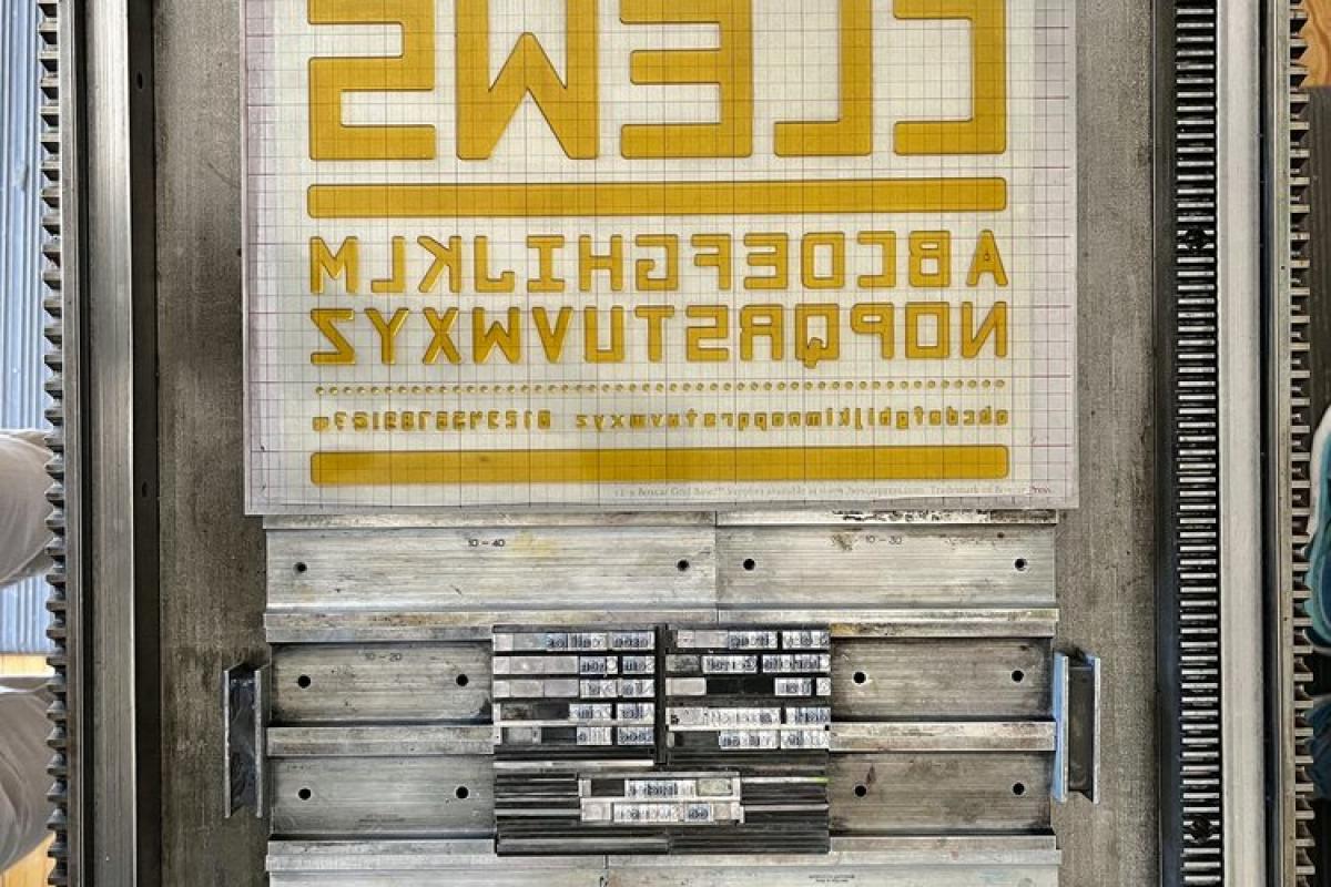 Image of Clews typeface on press