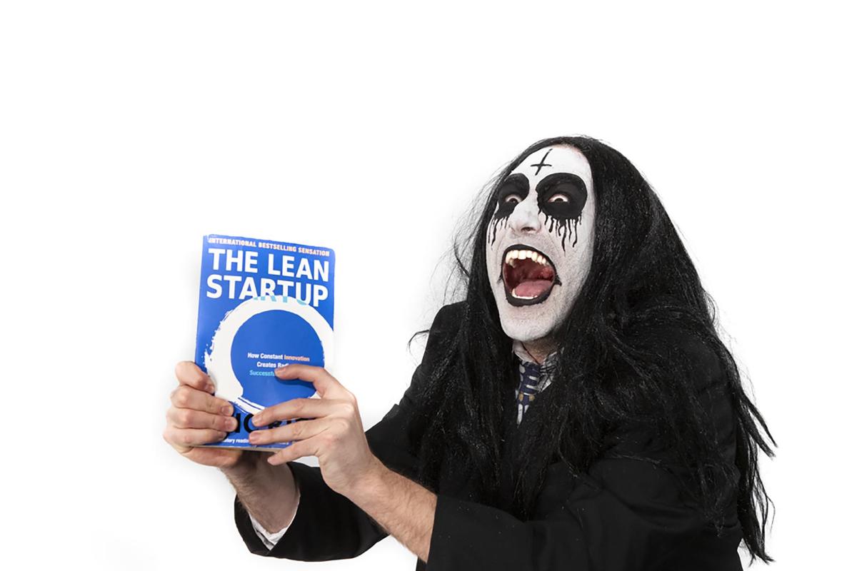 dungeon master ecstatically presenting a book