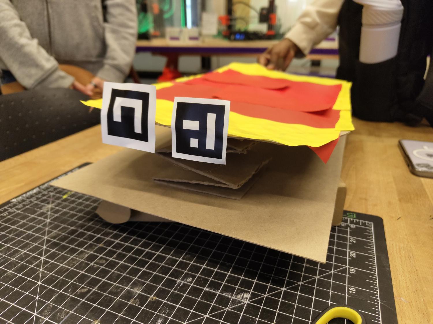 A cardboard skateboard controller