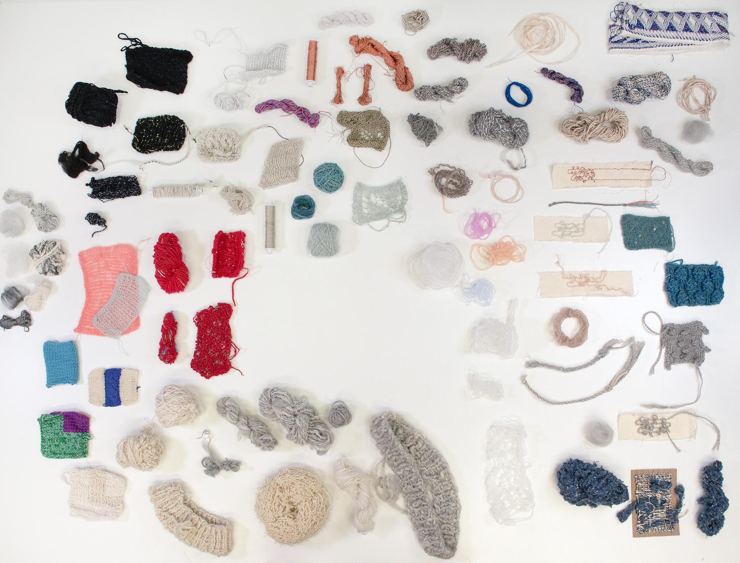 Table full of yarn textiles