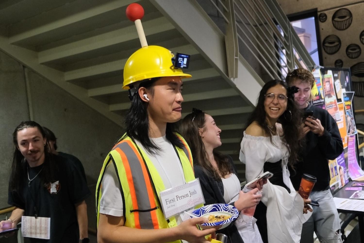 Whaaat Festival attendees in unique costumes eat cereal