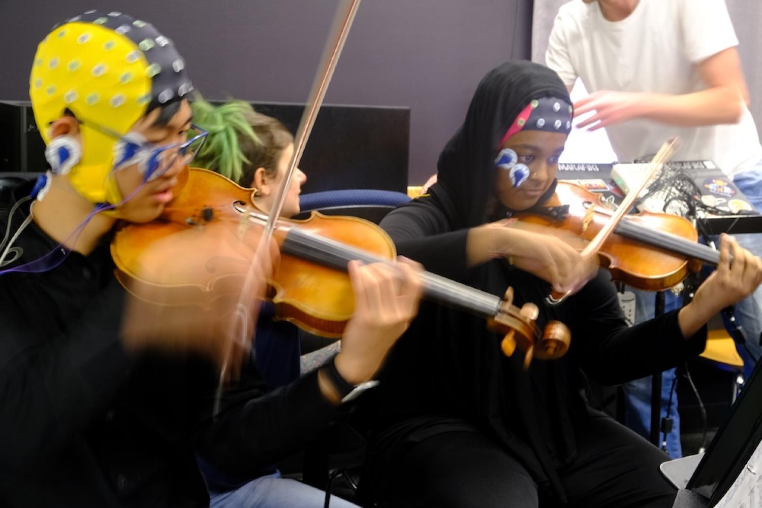 Violinists with EEG caps