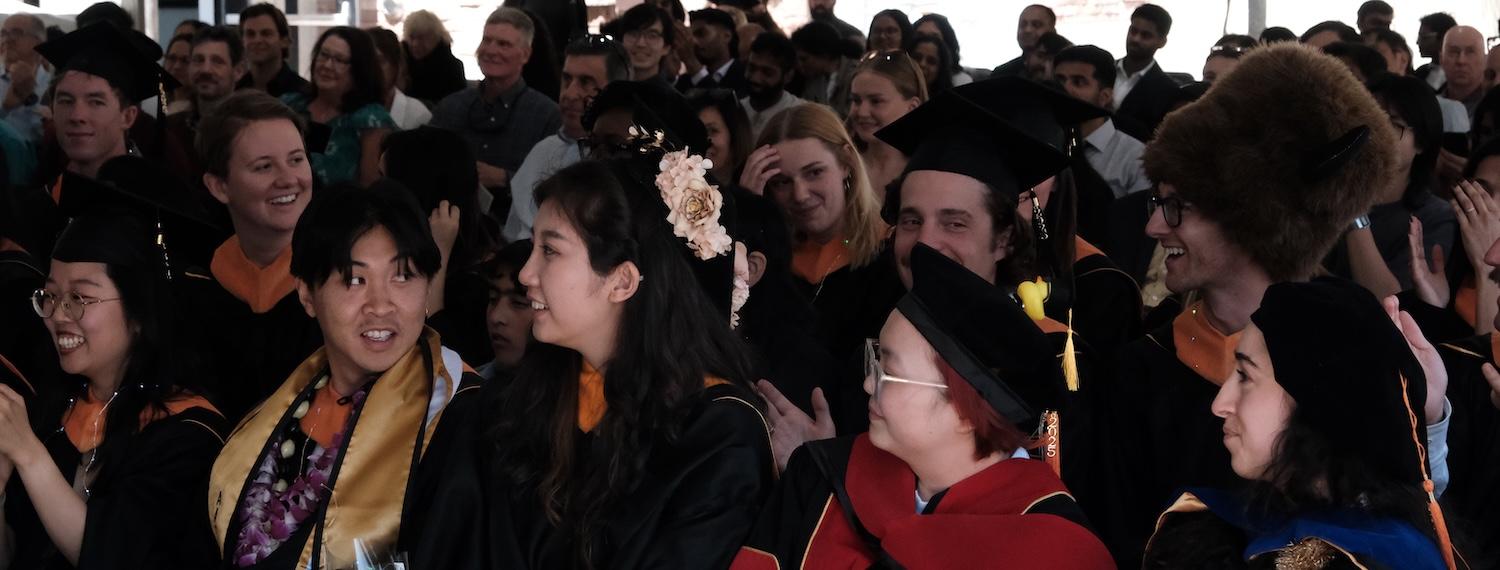 PhD and Master's students at graduation ceremony