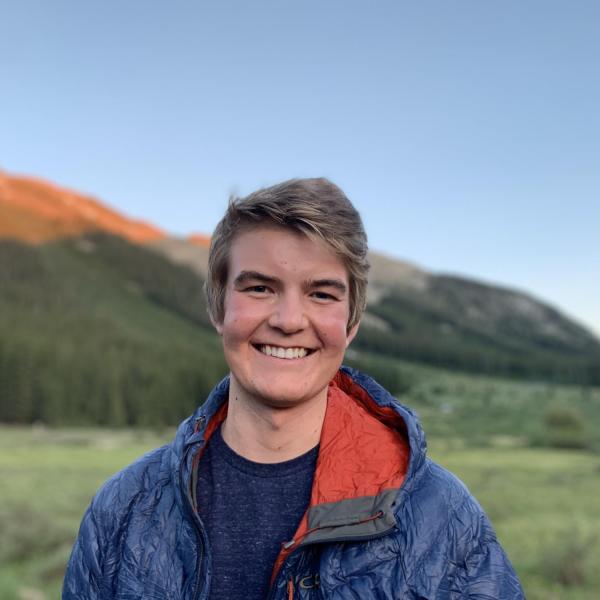 Henry Kvietok in front of mountain in Aspen.