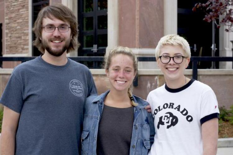 Brady Risendal, Marla Bernstein, and Meridith Richter stand outside the Roser ATLAS building.