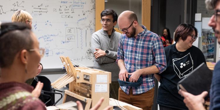 students in a lab looking at projects during ATLAS Open Labs