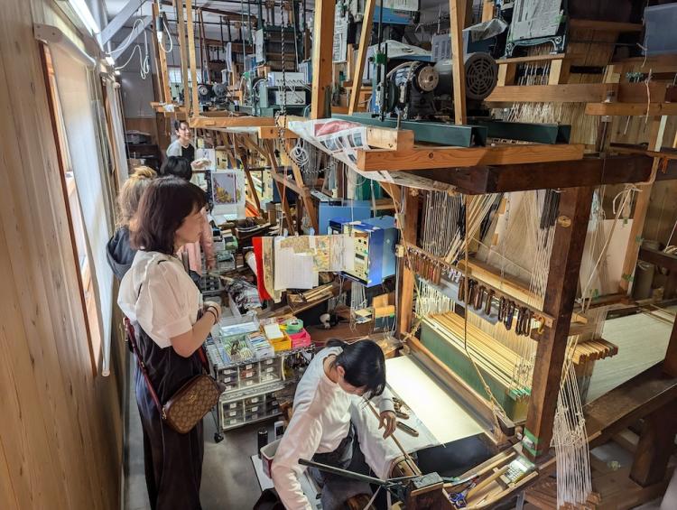 Devendorf tours a weaving facility in Japan