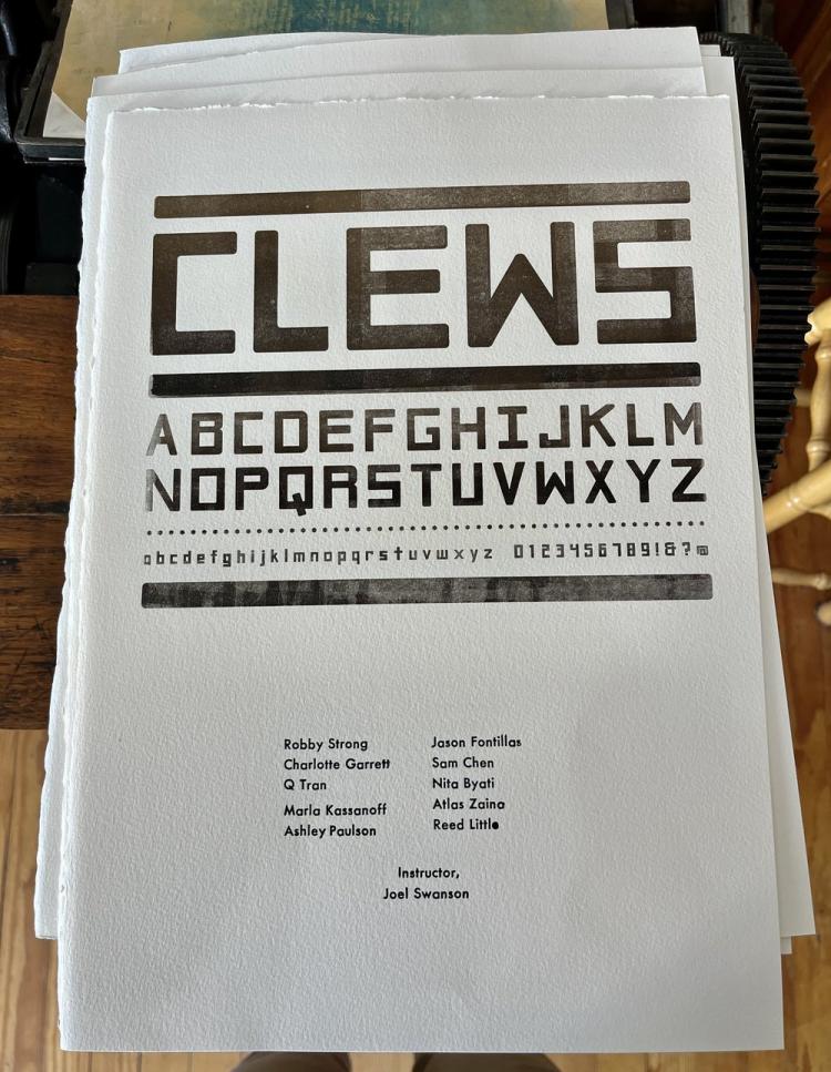 Clew's typeface printed on paper