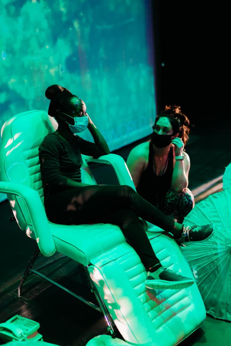Photo from Overworld performance: woman sitting in dentist chair next to another woman