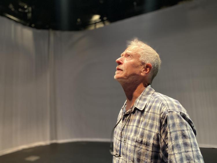 Bret Mann looks up inside the Black Box studio