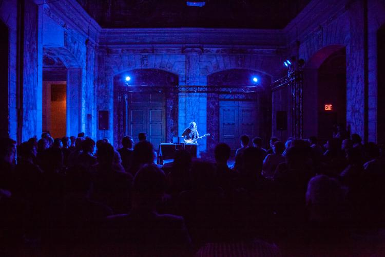 Michael Theodore plays electric guitar in a sold-out show at Issue Project Room in Brooklyn on June 26.