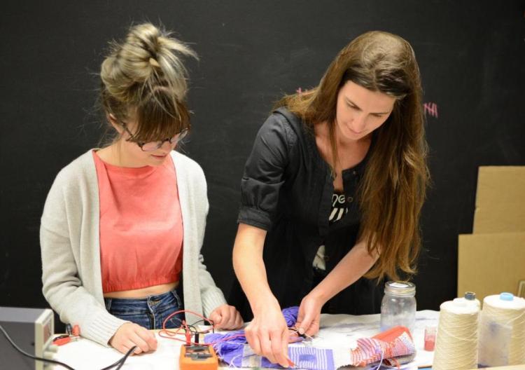 Laura Devendorf works with a lab assistant in her Unstable Design Laboratory.