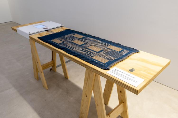 A Fabric that Remembers displayed on a table at the Centre for Heritage, Arts and Textile in Hong Kong
