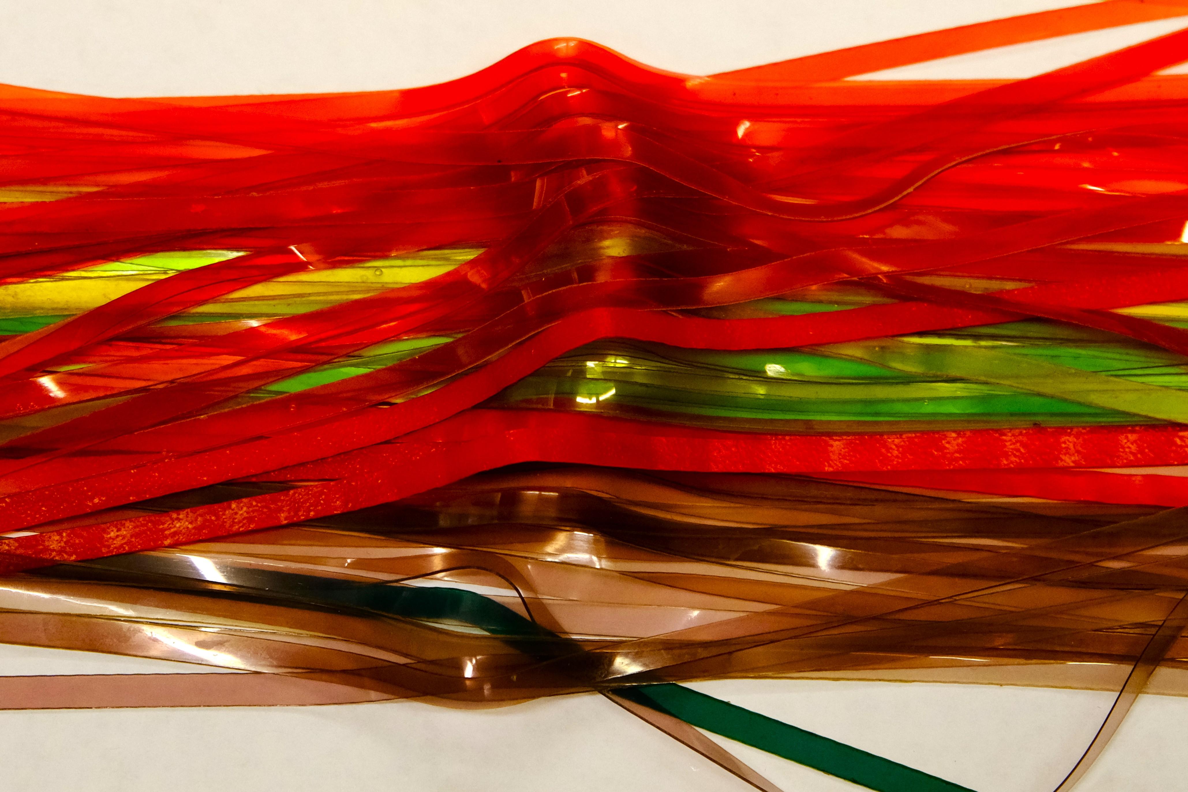 Pile of colorful plastic strands