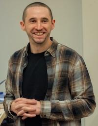 Professor Rivera standing in his lab