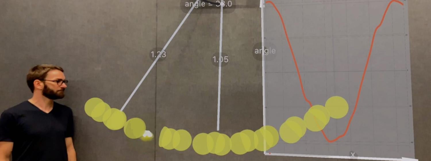 Using RealitySketch on an iPad to visualize the motion of a pendulum with a stroboscopic effect.