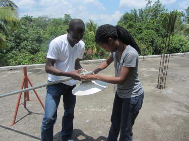 Two Social Impact students working