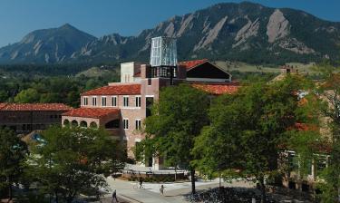 The Roser ATLAS Center building on a sunny day with the mountains in the background